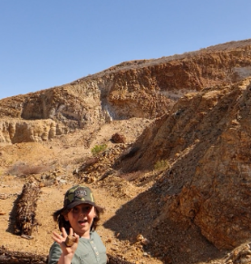 Child in front of the Baja California mine landscape