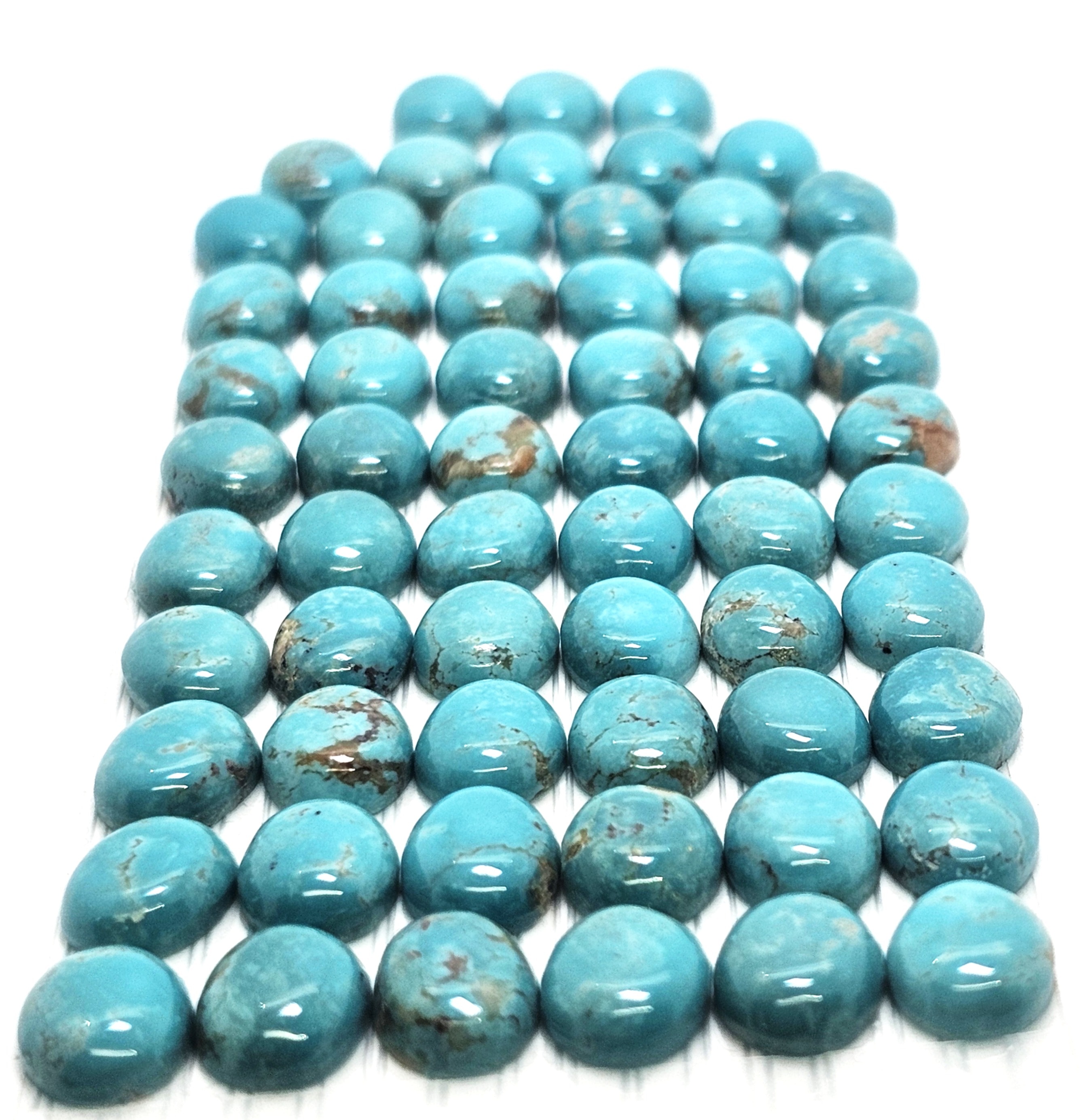 Turquoise Oval Cabs set — 62pc. 10 x 8mm