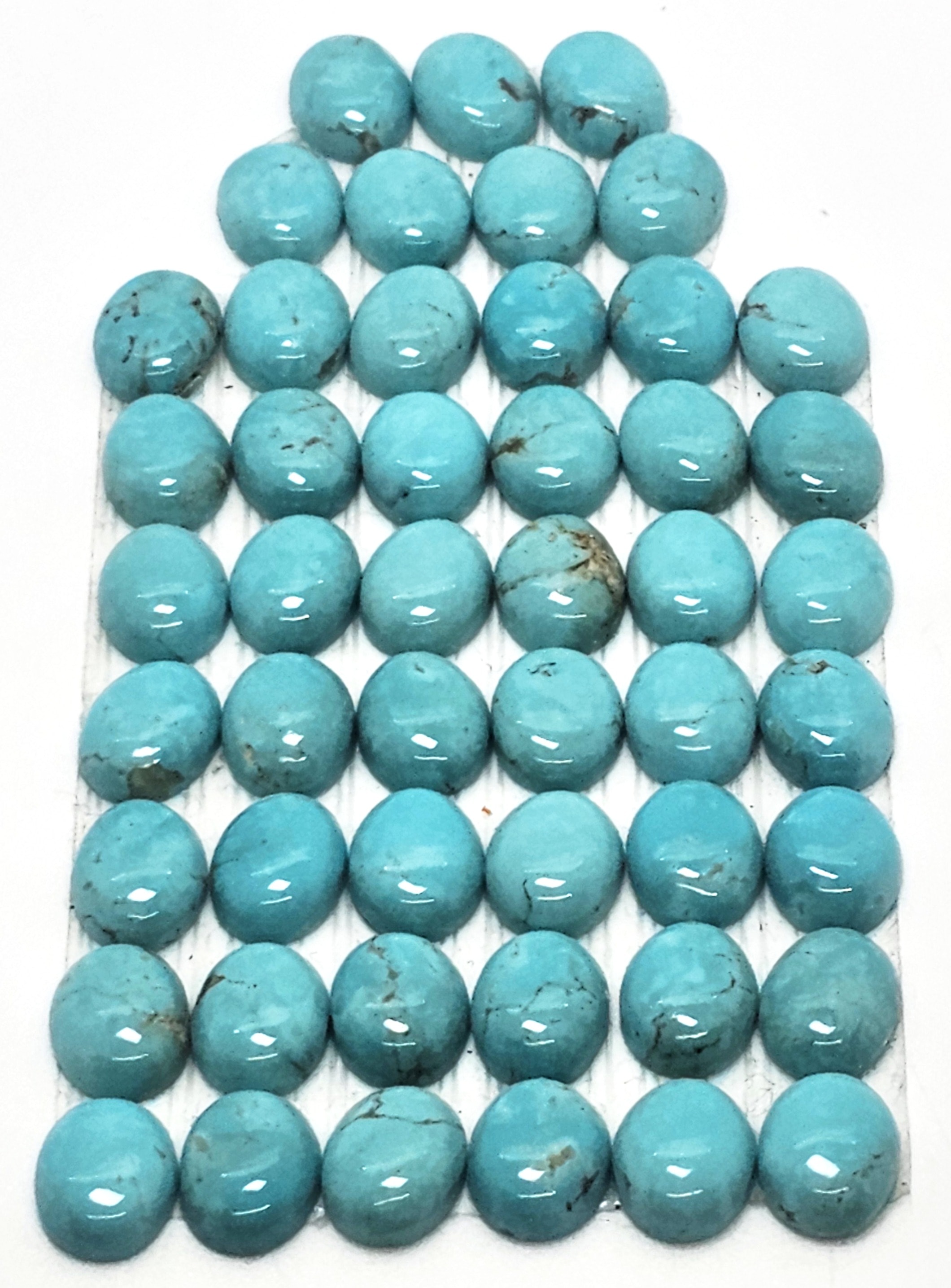 Turquoise Oval Cabs set — 49pc. 10 x 8mm